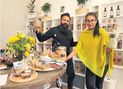  ??  ?? Environmen­talists Tyroshan Attidi Panagoda and his wife Ayesha at the plastic free shop