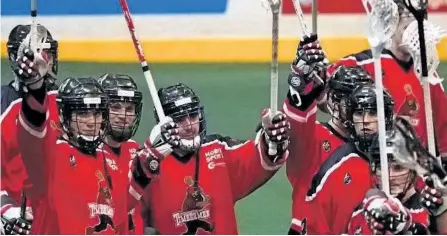  ?? CLIFFORD SKARSTEDT/EXAMINER FILES ?? Peterborou­gh Timbermen players raise their sticks to the fans following their team's decisive 10-7 win over Oshawa Outlaws during Arena Lacrosse League debut action on Feb. 26, 2017 at the Memorial Centre. The Timbermen will return to the Memorial...