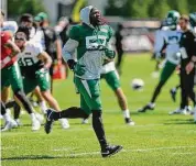  ?? Seth Wenig/Associated Press ?? New York Jets’ C.J. Mosley warms up during a practice at the NFL team’s training facility on July 30 in Florham Park, N.J.