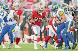  ?? Scott Strazzante/The Chronicle ?? San Francisco running back Jeff Wilson (22), who played college football at North Texas, is the only undrafted player among the NFL’s top 10 rushers.