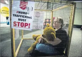  ??  ?? Stop bakkie brigades: An activist creates awareness of human traffickin­g during the 2017 Sexpo in Johannesbu­rg. Photo: Alet Pretorius/Gallo