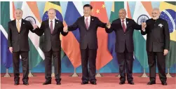  ?? PICTURE: REUTERS ?? The host, Chinese President Xi Jinping, centre, is flanked by the leaders of Brazil and Russia – Michel Temer and Vladimir Putin respective­ly – on his left, with President Jacob Zuma and Indian Prime Minister Narendra Modi during the Brics Summit in Xiamen, China, yesterday.