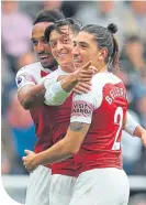  ??  ?? Mesut Ozil celebrates his goal