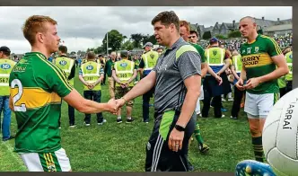  ??  ?? Leading by example: Fitzgerald in action and (left) shaking hands with Kerry manager Fitzmauric­e