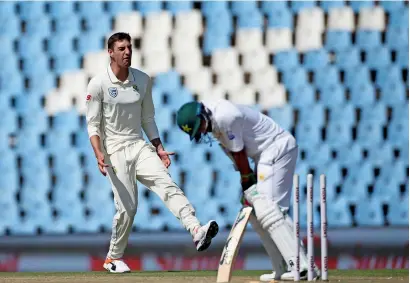  ?? Reuters ?? South Africa’s Duanne Olivier celebrates after he bowled Pakistan’s Imam-ul-Haq, who scored 57. —