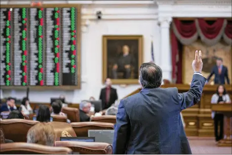  ?? JAY JANNER / AMERICAN-STATESMAN ?? State Rep. Tomas Uresti, D-San Antonio, votes against Senate Bill 4 in the House chamber on Thursday. All 53 Democrats voting on the measure declined to support the “sanctuary cities” legislatio­n.