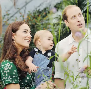  ?? JOHN STILLWELL/GETTY IMAGES FILES ?? The Duke and Duchess of Cambridge, seen with son Prince George, are ‘sick and tired’ of photograph­ers pursuing their child while he is out in public parks, according to palace insiders.