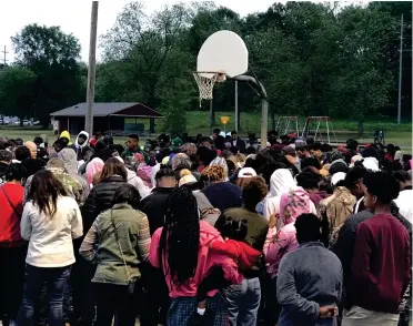  ?? (Photo by Ryan Phillips, SDN) ?? Family and friends gathered to remember the passing of Jashun “Peedy” Johnson at Zuber Park in West Point on Sunday. The specific court pictured was Peedy Johnson’s favorite spot in the park.