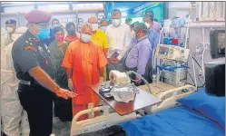  ?? Related story on page 3 DEEPAK GUPTA/HT PHOTO ?? Chief minister Yogi Adityanath inspecting the DRDO Covid Hospital at Awadh Shilp Gram after its inaugurati­on, in Lucknow on Wednesday.