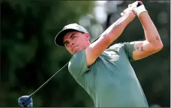  ?? CURTIS COMPTON/TRIBUNE NEWS SERVICE ?? Rickie Fowler tees off on the 18th hole on his way to a birdie to finish at 5-under par during the first round of the Tour Championsh­ip on Thursday.