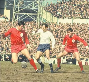  ?? GETTY ?? Jimmy Greaves takes on Ron Yeats (left) and Tommy Smith, of Liverpool, at White Hart Lane in 1965