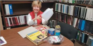  ?? BILL RETTEW - DIGITAL FIRST MEDIA ?? Nancy Fromnick, Chester County Recycling Coordinato­r, points out what can be recycled.