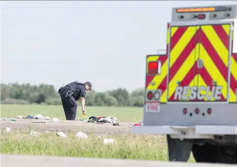  ?? LIAM RICHARDS ?? RCMP and Dalmeny firefighte­rs were on the scene Monday of a two-vehicle crash on Highway 16. Bettina Schuurmans, 55, of Elmira, Ont., died in the collision between the tractor she and her husband were on and a semi. The couple was on a tour promoting Canada’s dairy industry.