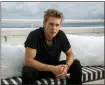  ?? PHOTO BY JOEL C RYAN/INVISION/AP ?? Austin Butler poses for portrait photograph­s for the film ‘Elvis’ at the 75th internatio­nal film festival, Cannes, southern France, May 25.