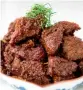  ??  ?? Rendang A spicy, creamy beef preparatio­n, traditiona­lly prepared on occasions. It is slow-cooked with kaffir lime and chillis.