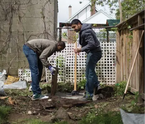  ?? NICK KOZAK/TORONTO STAR ?? Karl Fearon, left, and Matt Chung, are long-time friends who get together to help each other with home renovation­s — this one a deck demolition.