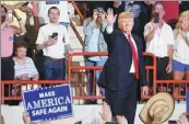  ?? CARLO ALLEGRI / REUTERS ?? US President Donald Trump waves to supporters in Harrisburg, Pennsylvan­ia, on Saturday to celebrate his first 100 days in office.