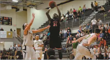  ??  ?? Cedartown’s Trevon Wofford goes up for a shot against Pepperell on Jan. 26, 2016.