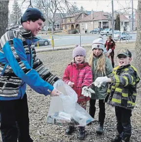  ?? SPECIAL TO THE EXAMINER ?? Students and staff from King George Public School organized a cleanup of Armour Hill and Rube Brady Park on April 5.