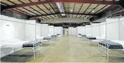  ?? Picture: Dino Lloyd ?? A general ward of quarantine beds at the Nasrec quarantine site near Soweto, where facilities are being prepared for more than 2,000 Covid patients.