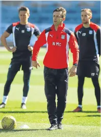  ?? Pictures: Steve Brown/SNS. ?? Left: Neil McCann is unveiled at Dens Park last night after agreeing to become Dundee’s new manager; managing director John Nelms, top, addresses the media while McCann looks on; the new Dark Blues boss pictured during his first training session in...