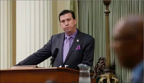  ?? AP Photo/RIch PedRoncell­I ?? In this photo taken July 11 is Assembly Speaker Pro Tempore, Kevin Mullin D-South San Francisco (left), at the Capitol in Sacramento, Calif.