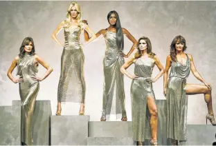  ??  ?? The original 1990s supermodel­s (from left) Carla Bruni, 49; Schiffer; Naomi Cambell, 47; Cindy Crawford, 51; and Helena Christense­n, 48, made a surprise appearance on the Versace runway in Milan in September.