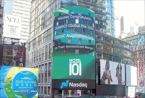  ?? ?? US NASDAQ Stock Exchange congratula­tes DoubleDrag­onÕs Hotel101 Global in a message at the iconic NASDAQ Tower Billboard in Times Square in New York City. Hotel101 Global and JVSPAC Acquisitio­n Corp recently signed a $2.3 billion binding merger agreement paving the way for the formerÕs Nasdaq listing slated to be completed by the third quarter.