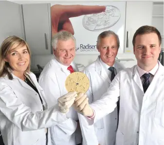  ??  ?? Jerry O’Brien (right), pictured in 2011 during the Radisens’ startup phase, with investor Orla Rimmington, banker Peter Walley (left) and EI’s Mort O’Connor