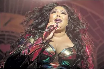  ?? Francine Orr Los Angeles Times ?? LIZZO delivers another blissful number during her performanc­e at the Hollywood Palladium on Friday.