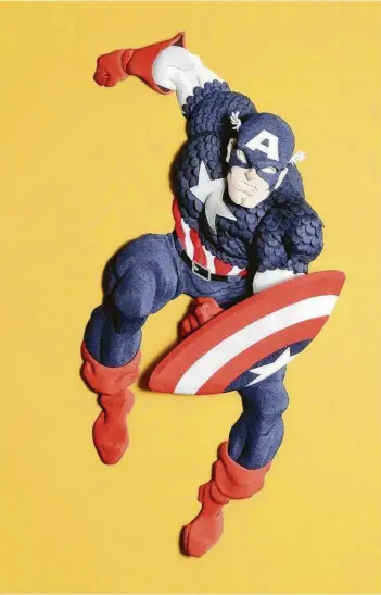  ?? Courtesy of the artist / Pearl Fincher Museum of Fine Arts ?? Cheong-ah Hwang’s paper relief sculpture “Captain America” is on view through Aug. 17 at the Pearl Fincher Museum of Fine Arts in the show “My Hero! Contempora­ry Art and Superhero Action.”