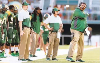  ?? JASON HIRSCHFELD/FREELANCE ?? Norfolk State head coach Latrell Scott, right, enjoyed his best season in 2019, when a school-record 13 players were named to the All-MEAC teams. The Spartans haven’t played a game since that season.