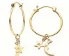  ??  ?? Karen Walker Moon & Star Charm hoops in cold