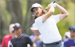  ?? Sam Greenwood / Getty Images ?? Tommy Fleetwood plays his shot from the ninth tee during the first round of The Players Championsh­ip on The Stadium Course at TPC Sawgrass on Thursday in Ponte Vedra Beach, Fla.