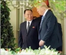  ?? ANDREW HARNIK - THE ASSOCIATED PRESS ?? President Donald Trump talks with Kim Yong Chol, left, former North Korean military intelligen­ce chief and one of leader Kim Jong Un’s closest aides, as they walk from the Oval Office at the White House in Washington, Friday