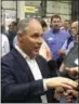  ?? ADAM BEAM — THE ASSOCIATED PRESS ?? EPA Administra­tor Scott Pruitt talks to a reporter after speaking at Whayne Supply in Hazard, Ky, Monday.