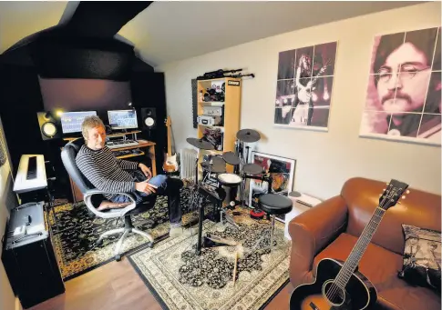  ?? Richard Swingler ?? > Mike Lowe in his recording studio, and his favourite object, a Westone Spectrum LX guitar