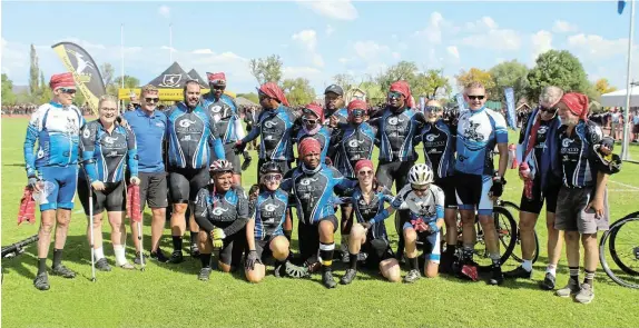  ?? Picture: UVIWE JARA ?? PEDALLING HOPE: The cyclists who took part in the 2024 QEF celebrate the end of their journey after doing a lap of honour at The Rec on Thursday.