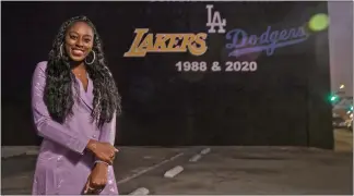  ?? Mel Melcon / Los Angelestim­es ?? Chiney Ogwumike, of the Los Angeles Sparks, is photograph­ed in front of a mural onthird Street in Los Angeles, honoring the Los Angeles Lakers and Los Angeles Dodgers on their 1988 and 2020 championsh­ip seasons. Ogwumike opted out of playing in the WNBA this season due to medical reasons.