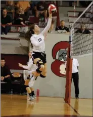  ?? Terrance Armstard/News-Times ?? Up and over: West Side Christian's Anna Williams soars for a kill in action this season against Garrett Memorial. The Lady Warriors will compete in the AACS Volleyball Tournament this week in Magnolia. They play Arkansas School of the Deaf Thursday at 7 p.m.