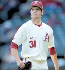  ?? NWA Democrat-Gazette/ANDY SHUPE ?? Caleb Bolden earned the victory for Arkansas on Wednesday, allowing no runs on 7 hits with 5 strikeouts and no walks in 7 innings.