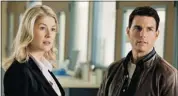  ?? Karen Ballard/paramount Pictures ?? A 5-foot-8 Tom Cruise plays 6-foot-5, much-loved hero Jack Reacher. Rosamund Pike plays a defence lawyer.