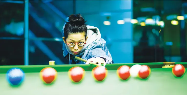  ??  ?? FOCUSED: Ng On-yee has won the world championsh­ip twice and six other titles. The 27-year-old is currently preparing to defend her world crown in Malta this week, where she is the big favorite. (AFP)