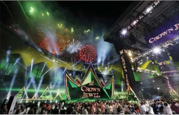  ?? AMR NABIL — THE ASSOCIATED PRESS FILE ?? Spectators watch fireworks during the World Wrestling Entertainm­ent’s Crown Jewel matches at King Fahd Internatio­nal Stadium in Riyadh, Saudi Arabia, on Oct. 31, 2019.