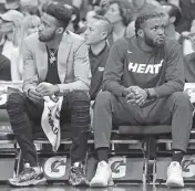  ?? DAVID SANTIAGO dsantiago@miamiheral­d.com ?? Derrick Jones Jr., left, and Justise Winslow have missed several games and won’t play Tuesday at home against the Pistons. Winslow remains in concussion protocol.