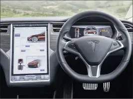  ??  ?? Tesla offers one of the biggest on-board display screens in the automotive industry. Would you find this massive panel distractin­g, or useful?