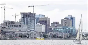  ?? CP PHOTO ?? A sailboat is seen in front of the Halifax skyline in this 2016 photo. Halifax’s bid to woo Amazon’s new corporate headquarte­rs started out largely as a cheerleadi­ng exercise but instead it has set off a firestorm of debate.