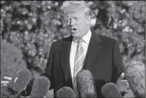  ?? Ap photo ?? President Donald Trump speaks to reporters before leaving the White House in Washington on Tuesday for a Thanksgivi­ng trip to his Mar-a-lago estate in Palm Beach, Fla.