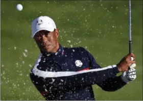  ?? FRANCOIS MORI - THE ASSOCIATED PRESS ?? Tiger Woods of the US plays from a bunker on the 3rd hole during a practice session at Le Golf National in Guyancourt, outside Paris, France, Tuesday, Sept. 25, 2018. The 42nd Ryder Cup will be held in France from Sept. 28-30, 2018 at Le Golf National.