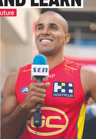  ?? ?? The Gold Coast’s Touk Miller at Monday’s AFL Captain's Day at Marvel Stadium.
Picture: Daniel Pockett/Getty Images iNSET: Gold Coast’s head coach Damien Hardwick and Ethan Read during a Suns training session at Heritage Bank Stadium. Picture: Chris Hyde/Getty Images